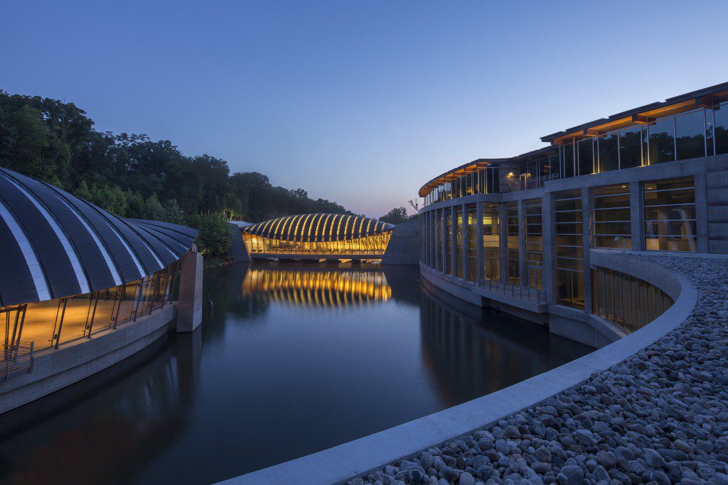 View of dining bridge at dusk; photography by Dero Sanford. Courtesy of Crystal Bridges Museum of American Art, Bentonville, Arkansas.