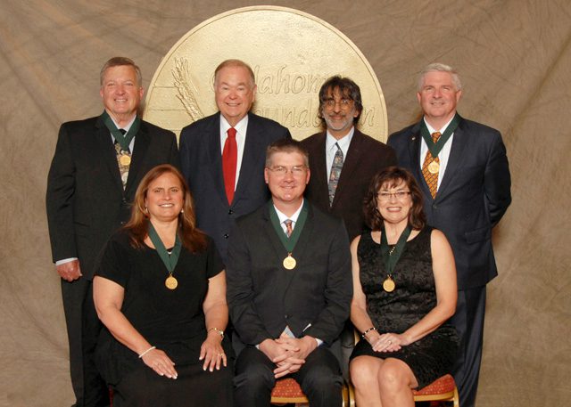 Front row: Andrea Rains, Garey Fox, Randy Utt. Back row: Bill Caire, David L. Boren, Akhil Reed Amar, Frank Cooper, Academic Awards Banquet, The Oklahoma Foundation of Excellence.