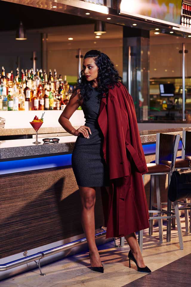 The Row brick coat, $1750; Lanvin textured dress, $1280; Lavin black pumps, $695; The Row leather bag, $1990; Dana Kellin moon stone earrings, $740, all from Aversions. Chanel blue ombre cateye sunglasses, $399, Visions.