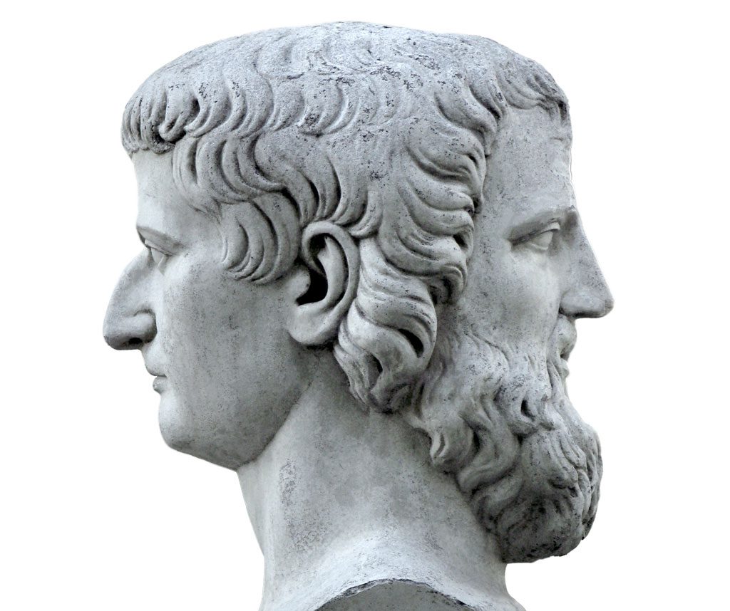 Janus sculpture on a black background. Marble bust of the mythol