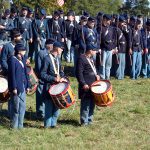 Union soldiers participate in a morning parade.