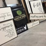 Hand lettering signs is one of Whitfield’s favorite duties on the job.