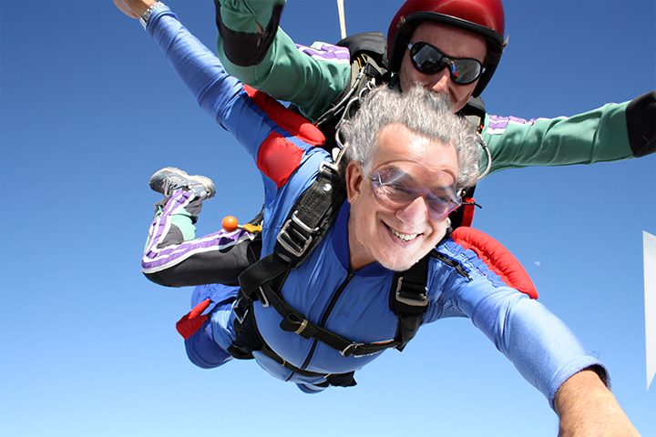Skydiving tandem senior man